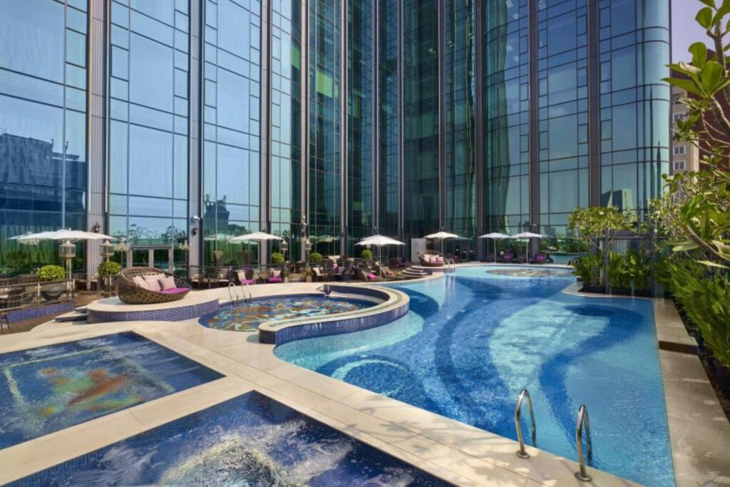 Luxury hotel swimming pool mosaic design by JNJMosaic