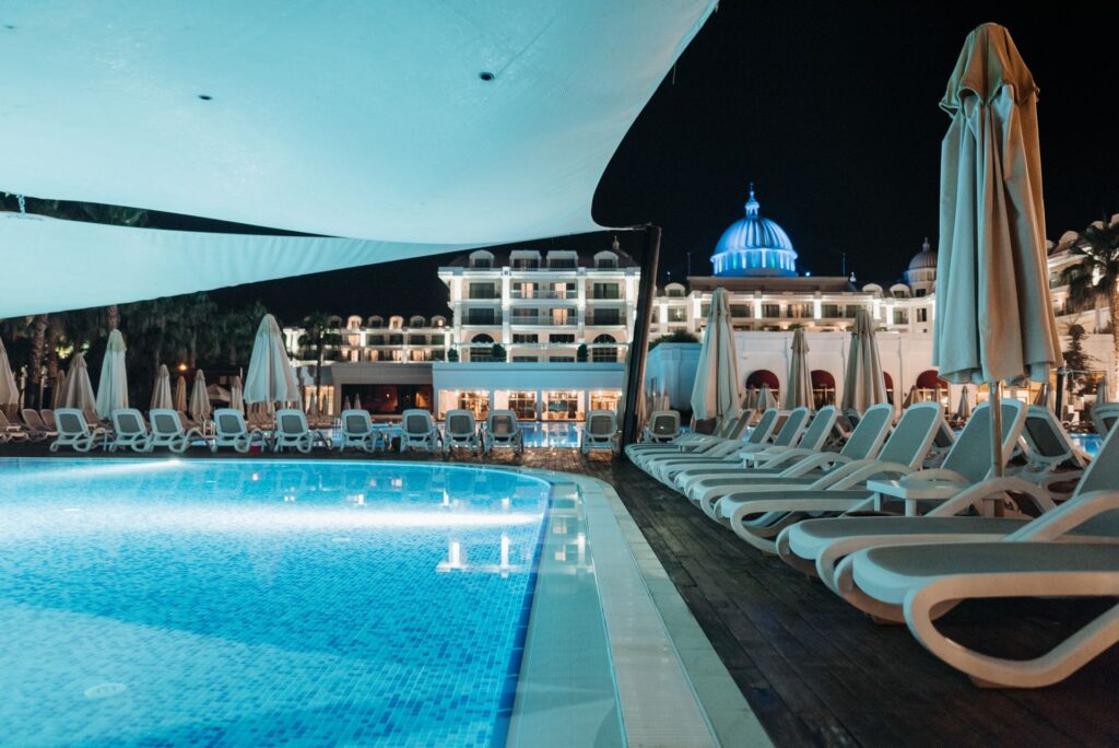 A massive 24000 square meter resort swimming pool with beautiful blue mosaic tile surfaces
