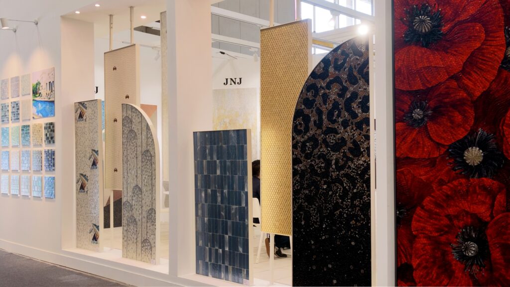 Inside the JNJMosaic Booth at Cersaie 2026: Art, Materials and Meaningful Conversations 3 Artistic mosaic mural and decorative panels displayed at the JNJ booth