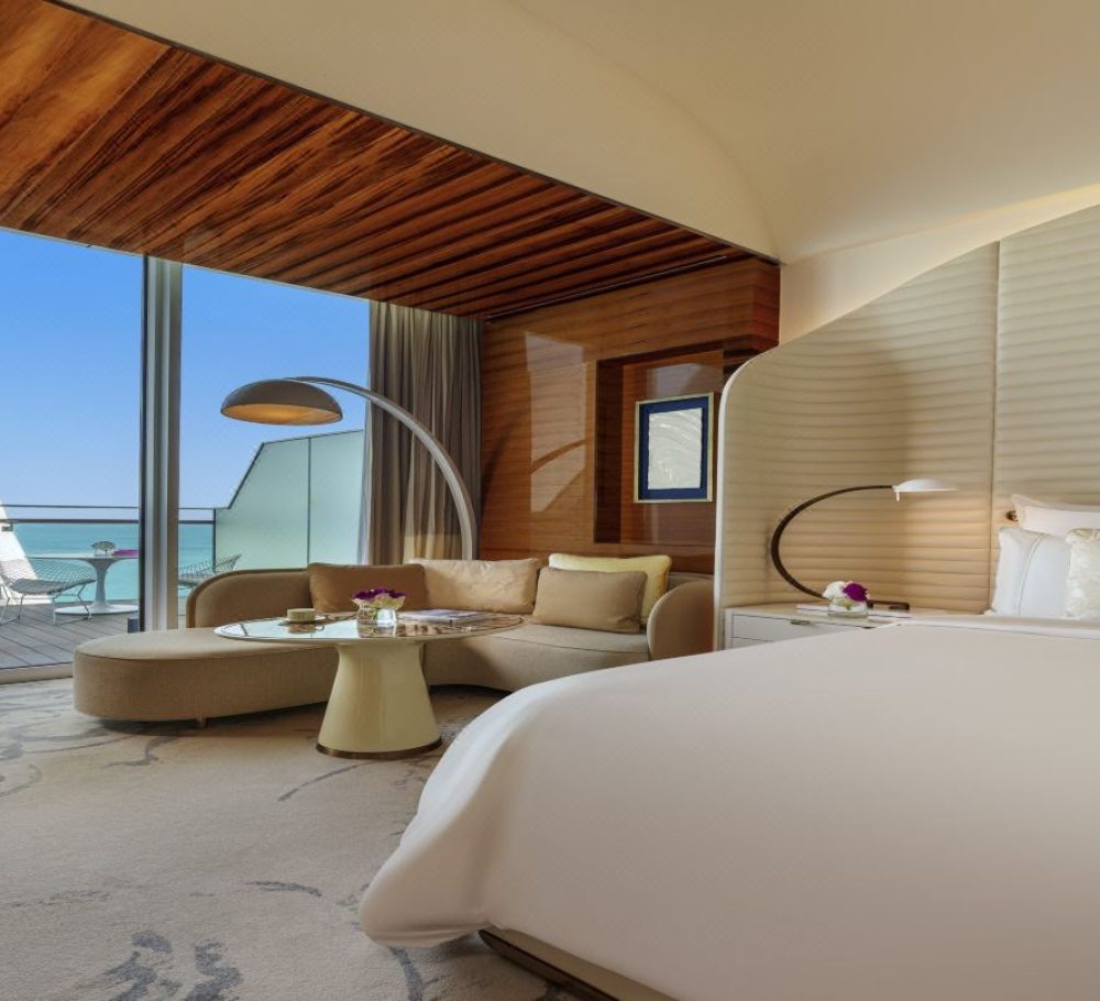 Upscale guest room suite with modern design and understated luxury ambiance at Fairmont Doha