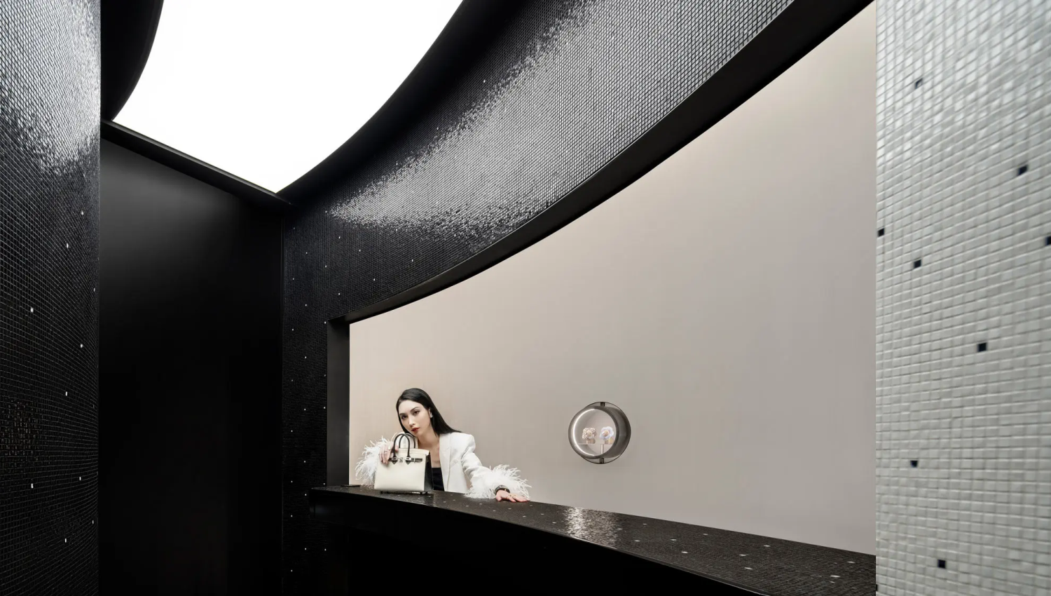 Monochromatic mosaic surfaces showcasing controlled texture gloss and reflection