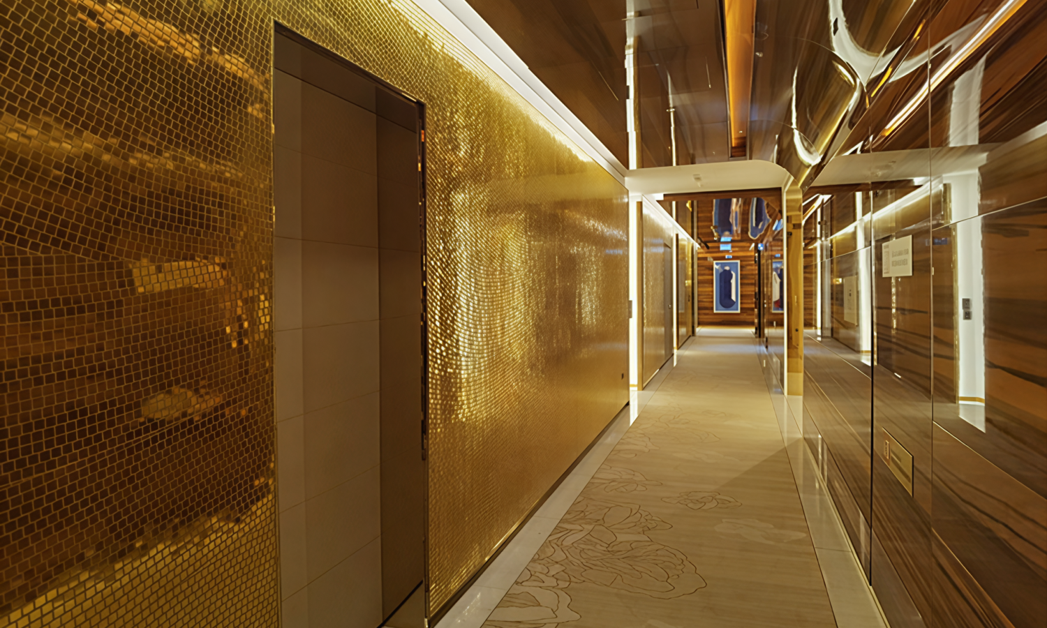 A large-scale luxury wall covered in 10,000 square meters of 24K pure gold mosaic tiles