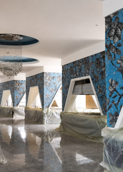 Hotel restaurant mosaic wall featuring plum blossom patterns created with sieve plate technique