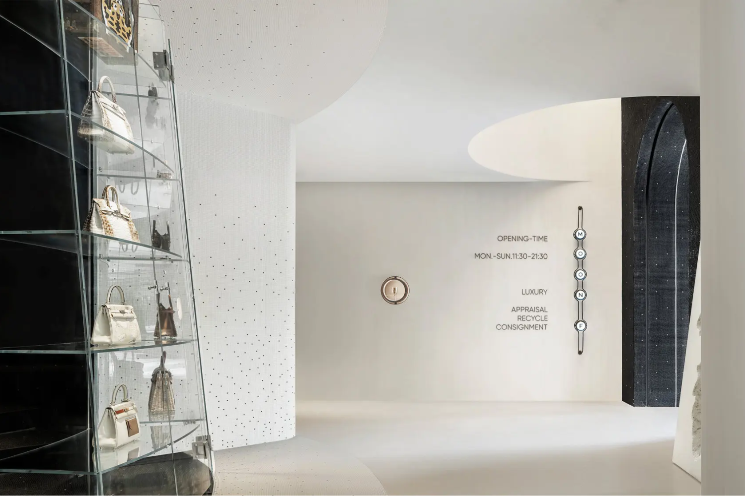 Black and white mosaic material palette defining MOON.F retail identity