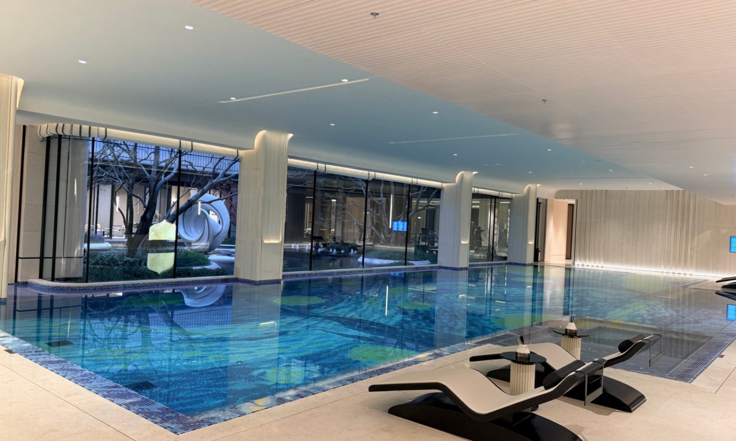 Panoramic view of the mosaic swimming pool at Tianyao Xu Clubhouse